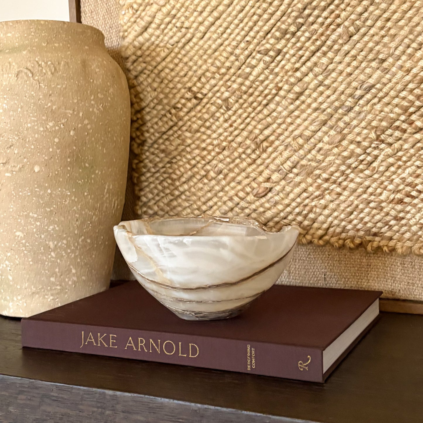 Hand carved amber onyx bowl made from natural stone with warm honey-gold tones