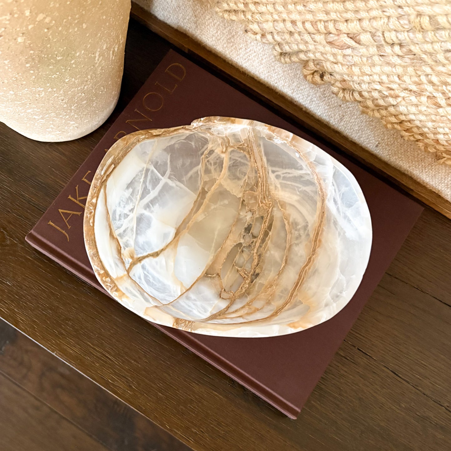Natural amber onyx bowl hand carved by artisans, translucent golden stone