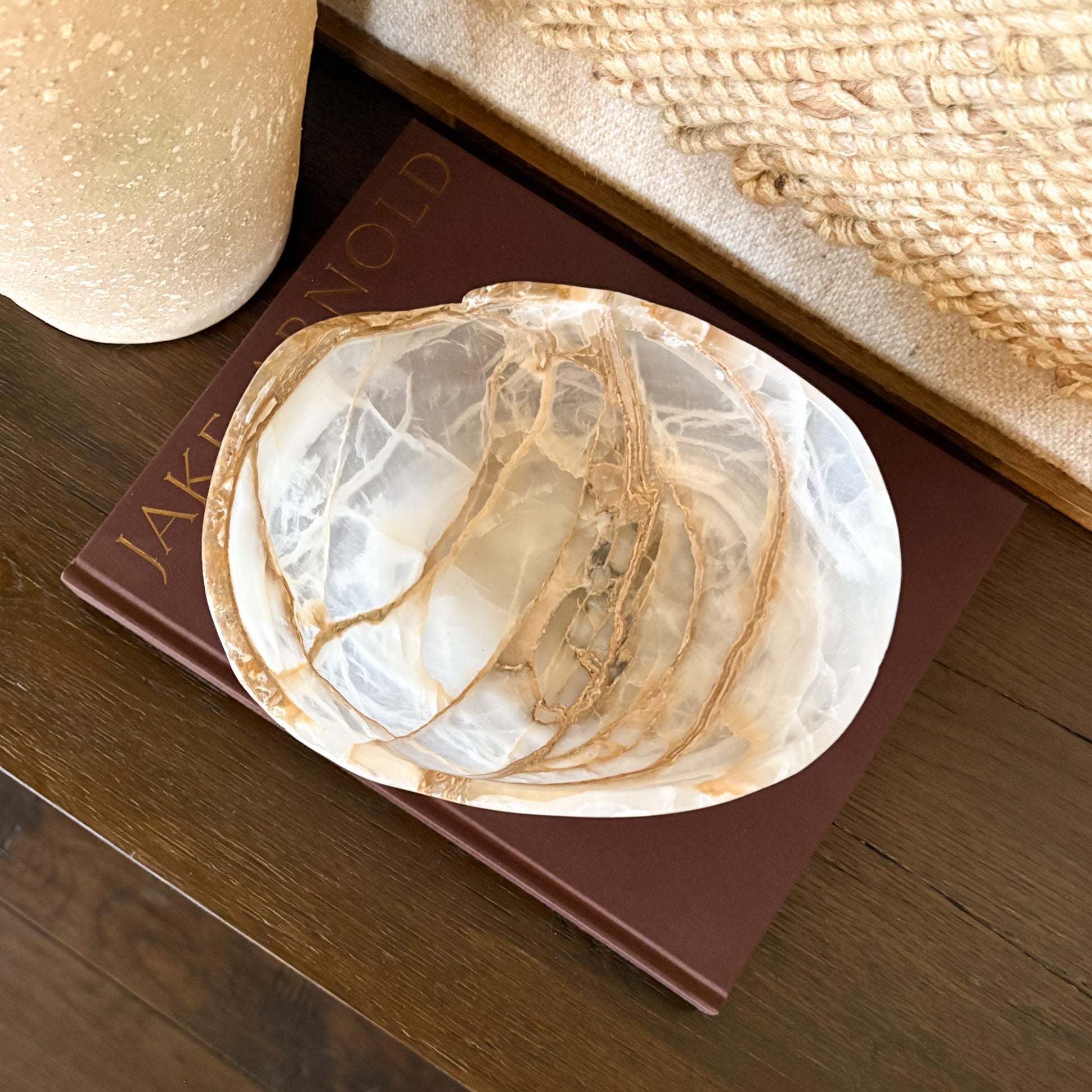 Natural amber onyx bowl hand carved by artisans, translucent golden stone