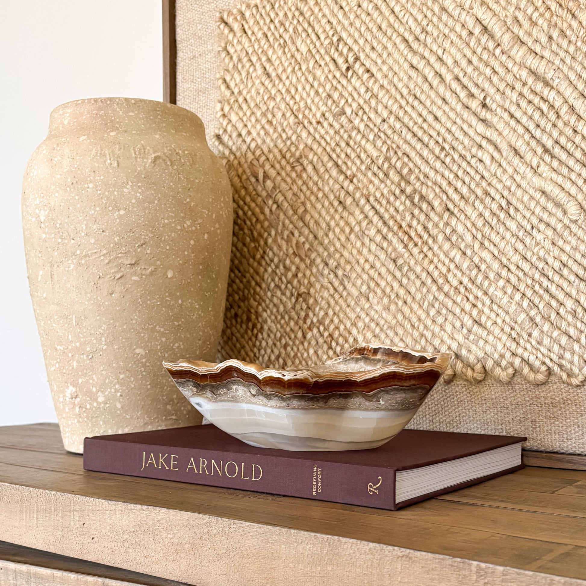 Hand carved amber onyx bowl made from natural stone with warm golden tones