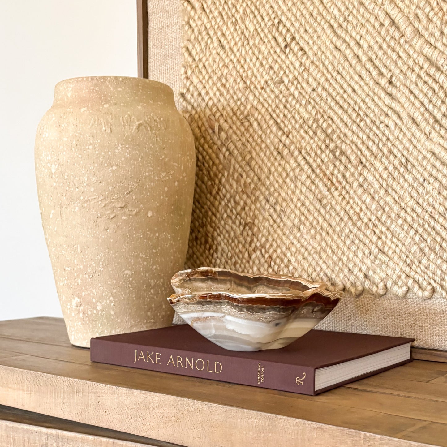 decorative hand carved amber onyx bowl used as a luxury home decor accent