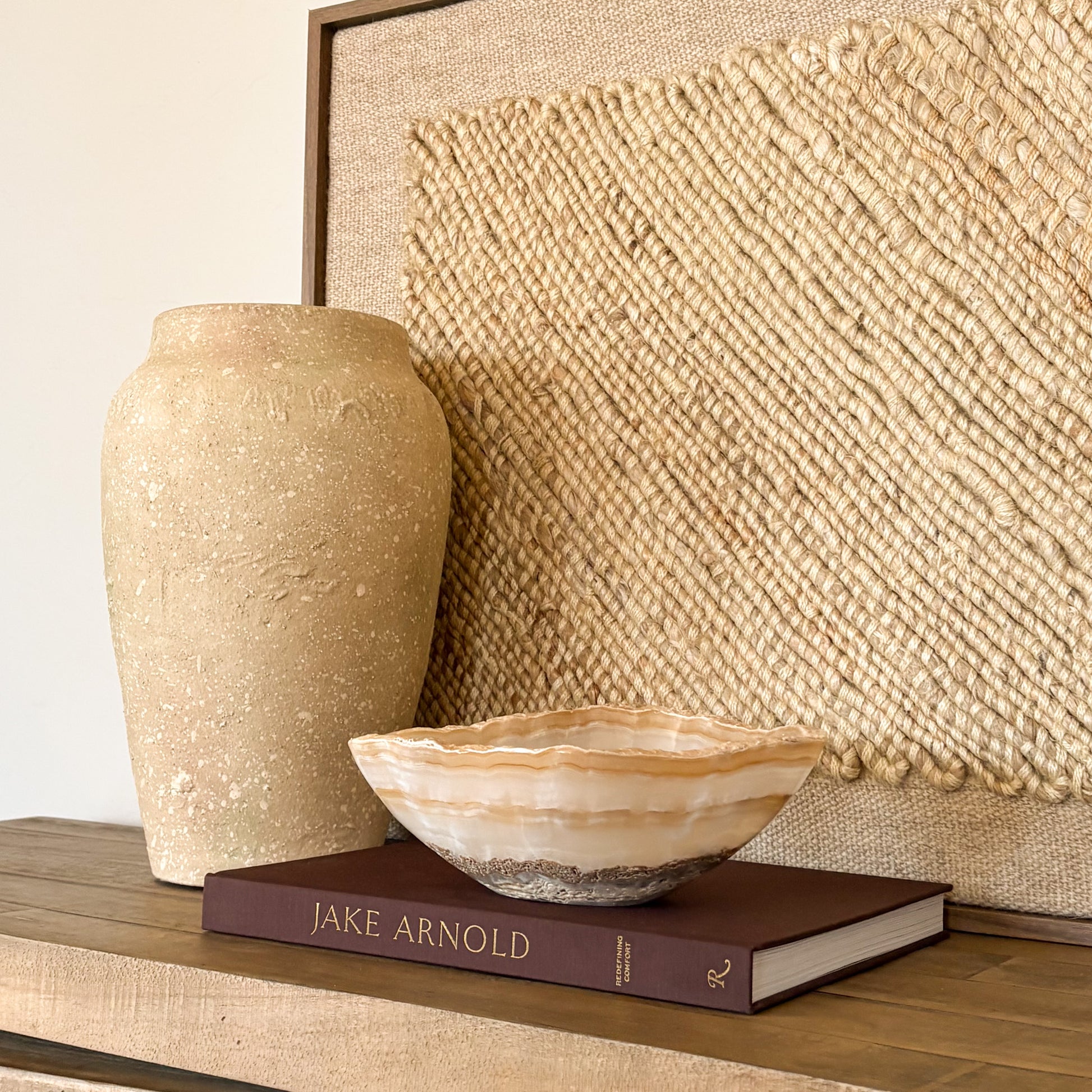 Luxury hand carved onyx bowl in white and amber tones for elegant home decor