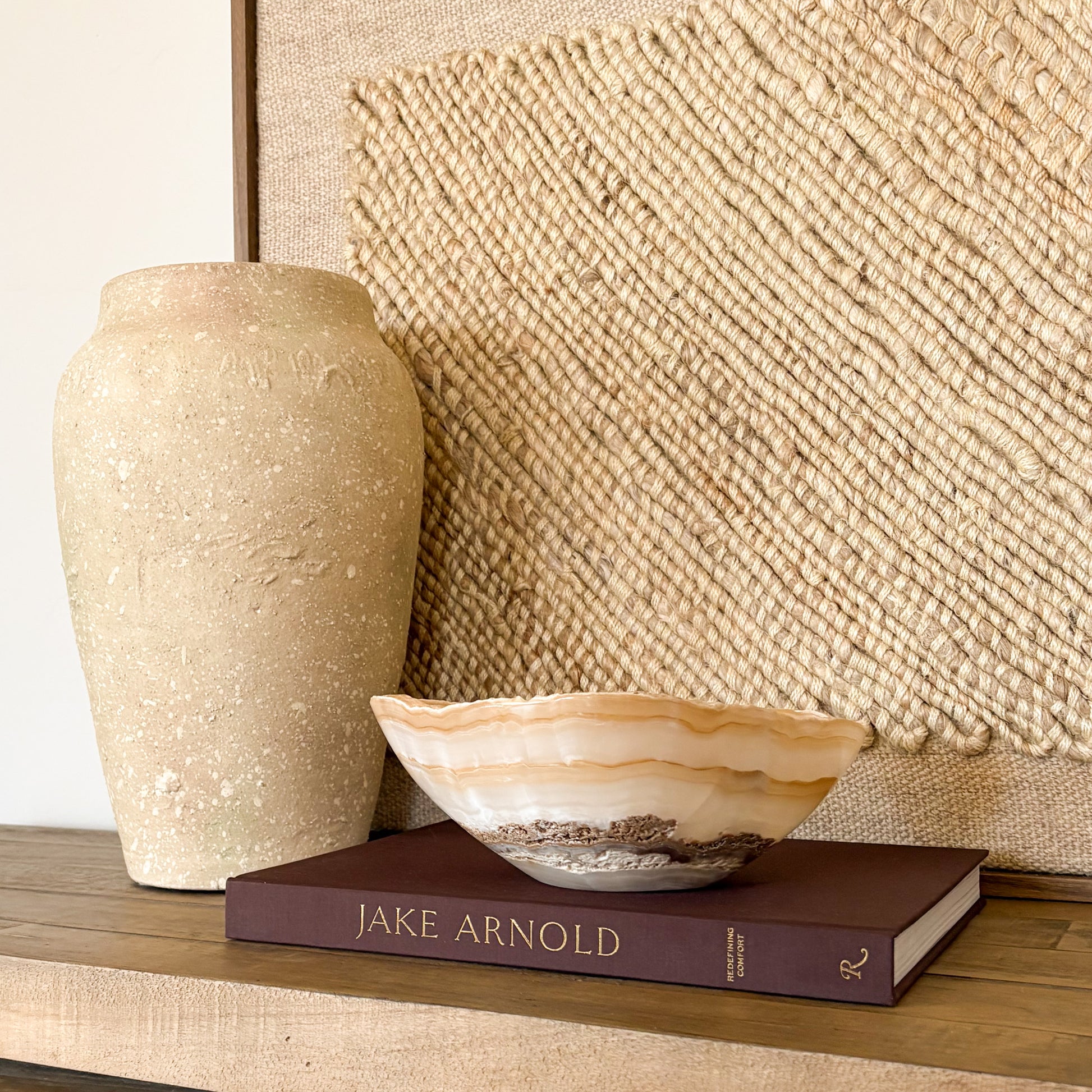 Luxury white and amber onyx decorative bowl displayed in modern interior