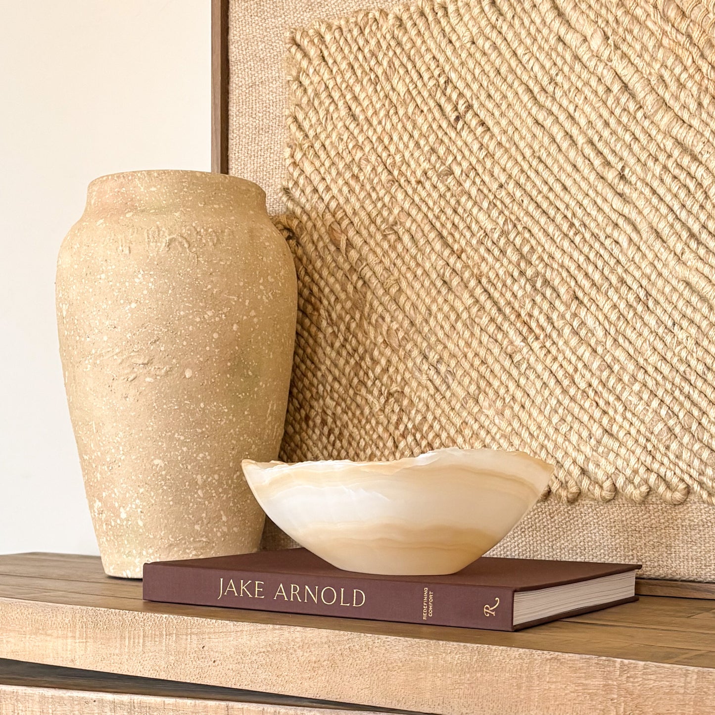 Luxury white and amber onyx decorative bowl displayed in modern interior