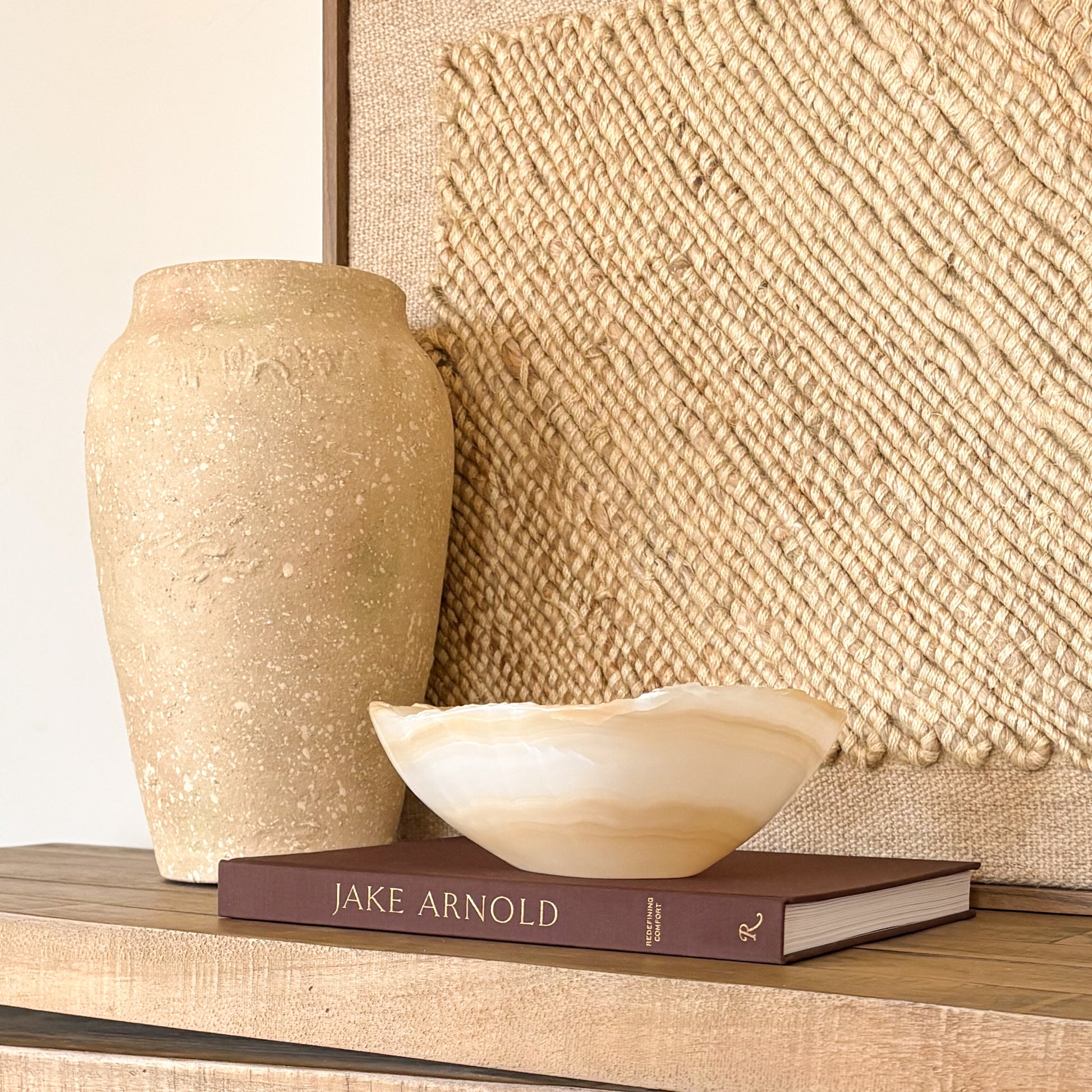 Luxury white and amber onyx decorative bowl displayed in modern interior