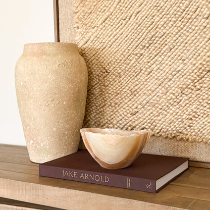 Amber onyx bowl displayed as luxury home decor accent