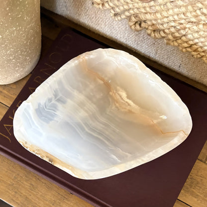 Hand carved amber onyx bowl with natural stone veining
