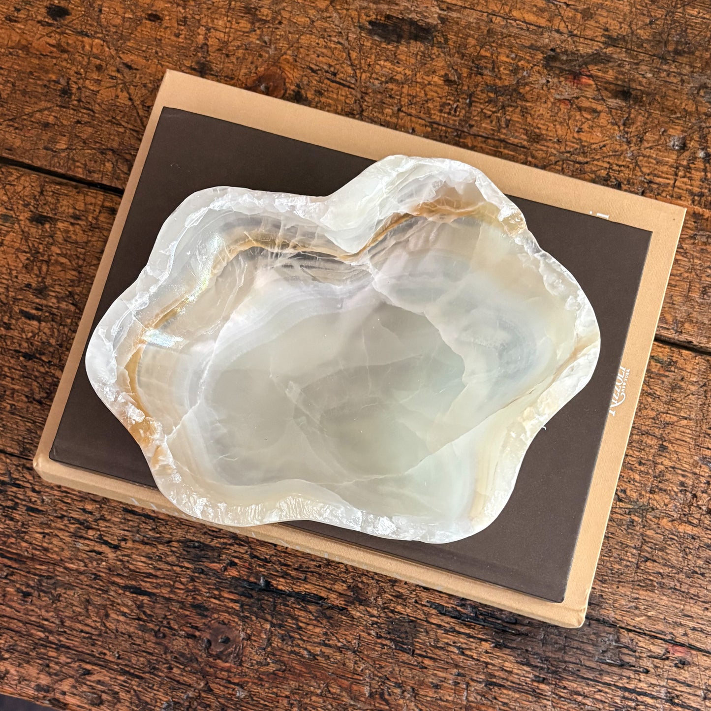 Handmade amber onyx bowl showcasing natural stone variations