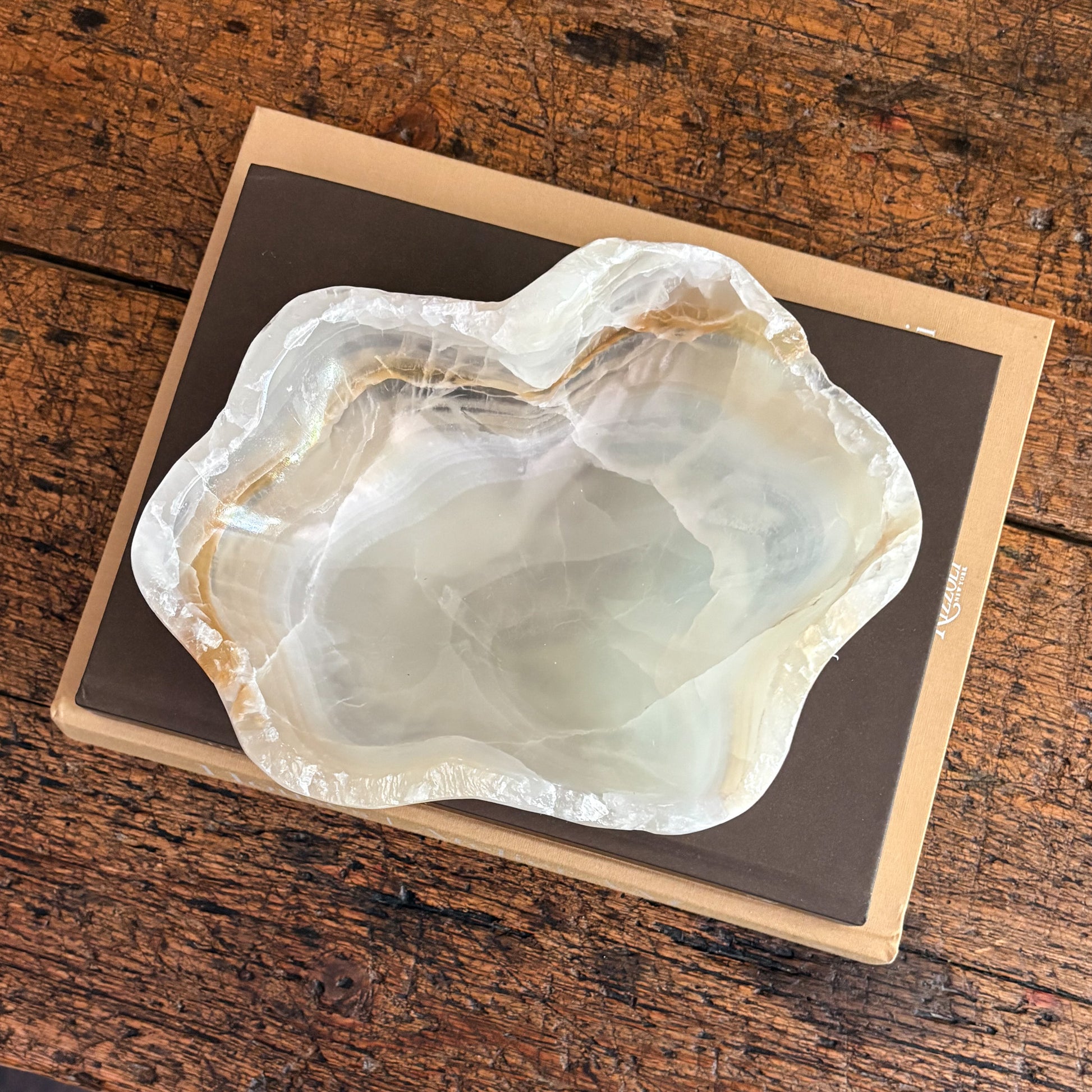 Handmade amber onyx bowl showcasing natural stone variations