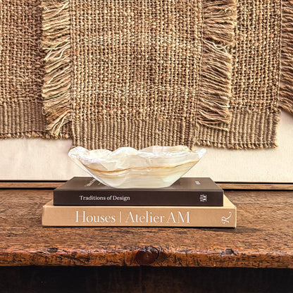 Artisan-carved amber onyx bowl featuring unique mineral patterns