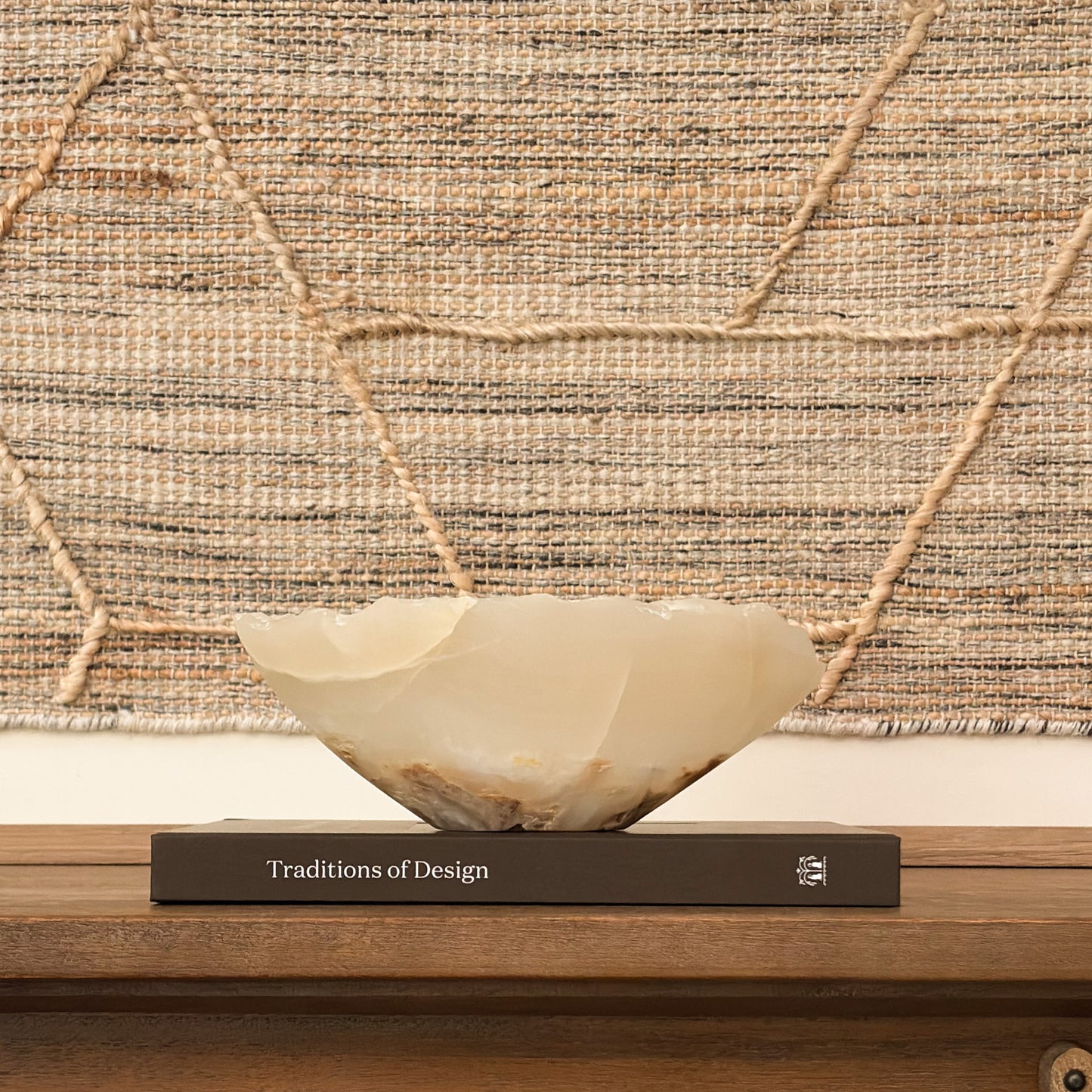 Artisan carved amber onyx bowl featuring unique natural veining and rich earth tones