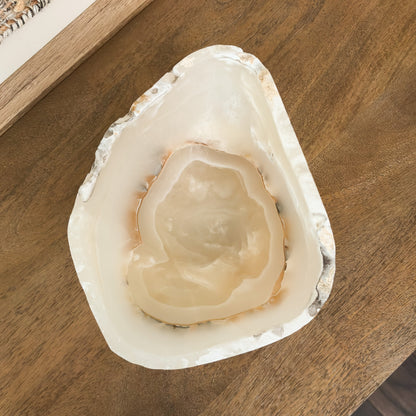 Decorative natural amber onyx bowl with rich golden hues and unique stone character