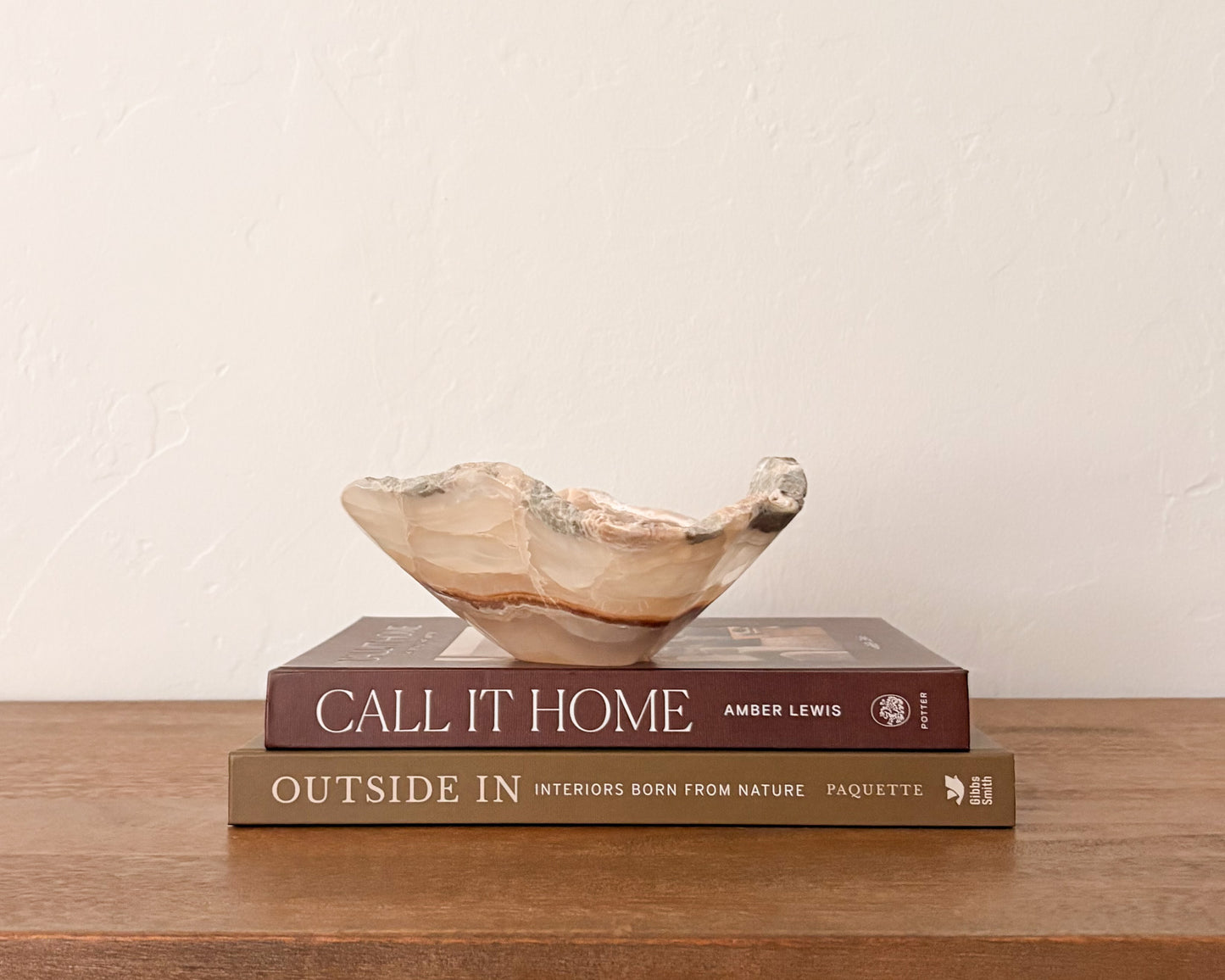 Hand-carved amber onyx bowl with natural golden brown veining