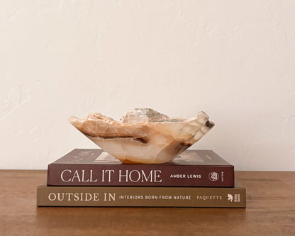 Natural amber onyx decorative bowl with unique veining and color variatio