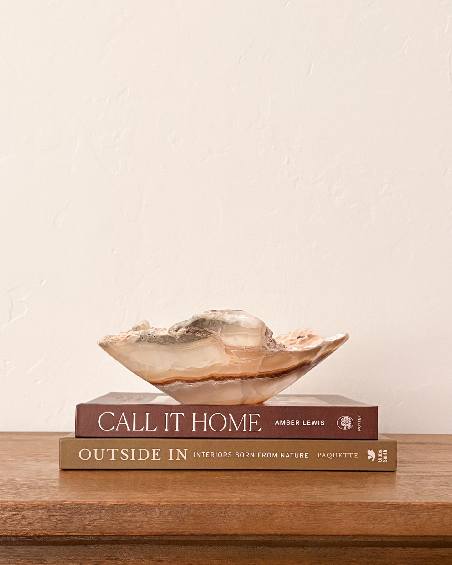 Hand-carved natural amber onyx bowl with organic stone veining