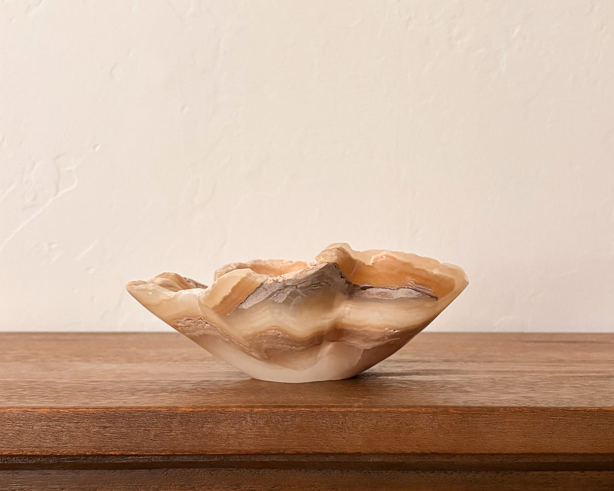 Amber onyx bowl with warm honey and cream tones