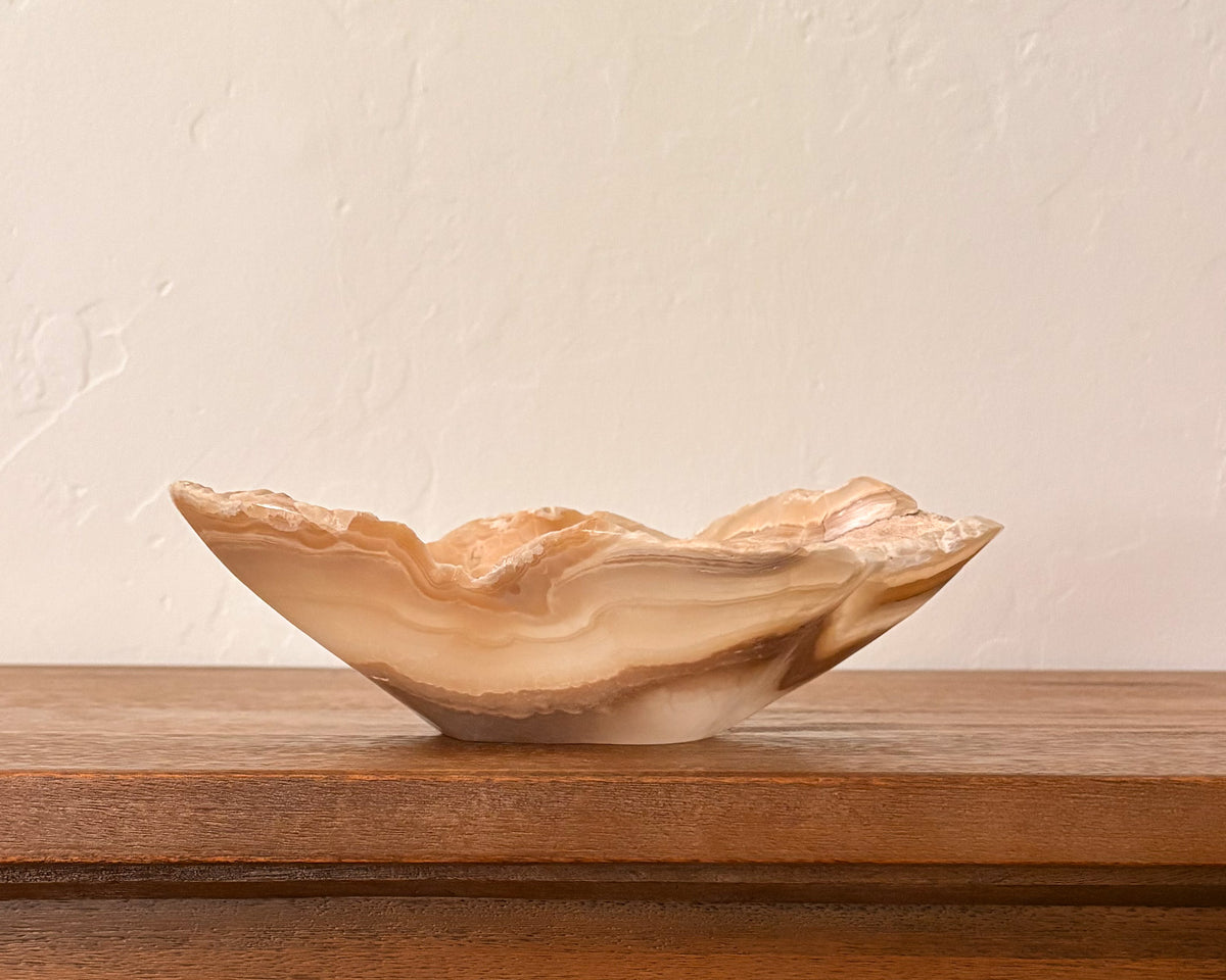 Hand-carved amber onyx decorative bowl