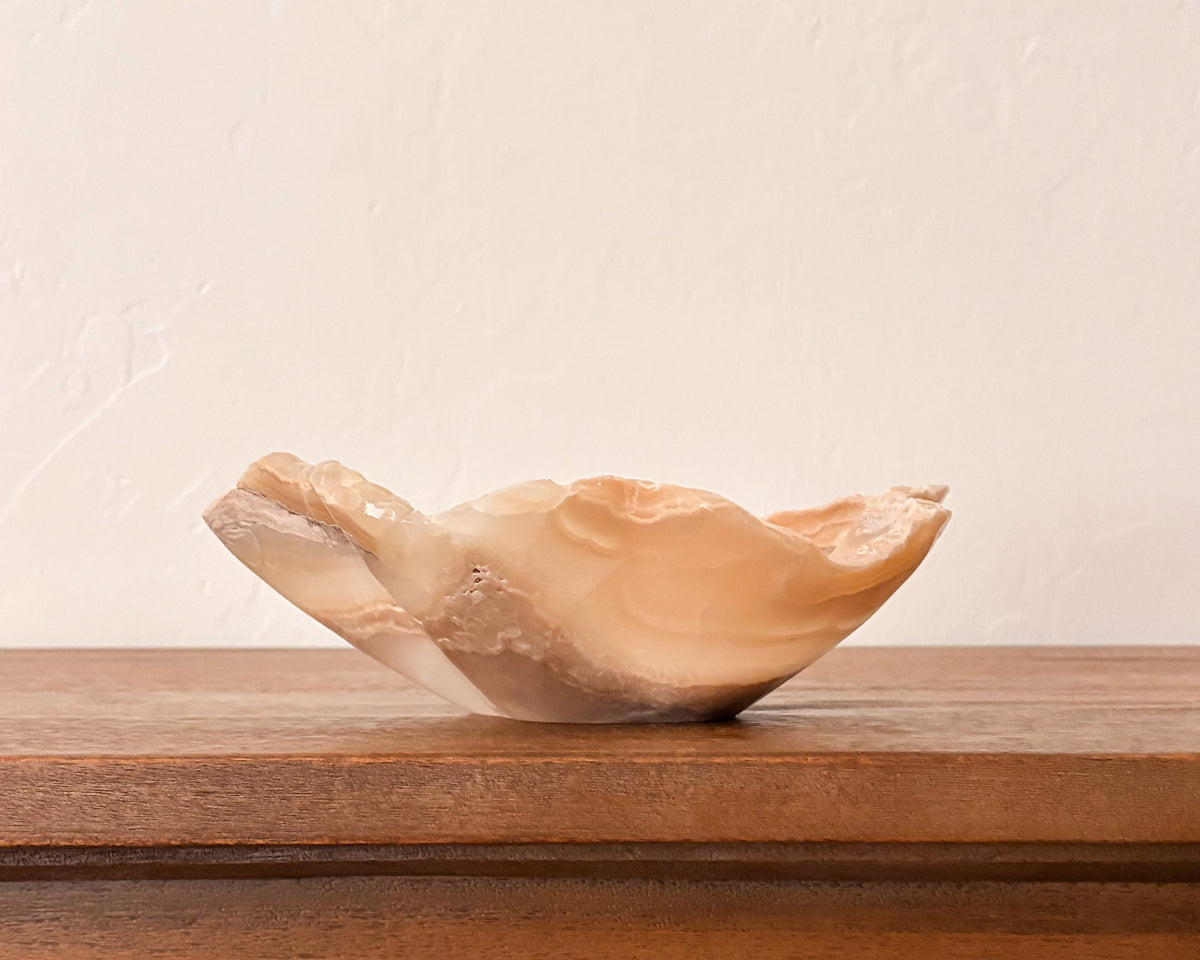 Amber onyx stone bowl with natural color variation