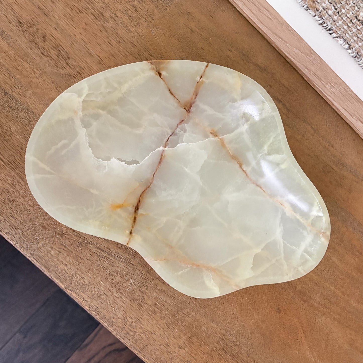 Decorative green onyx stone bowl showcasing one-of-a-kind natural veining