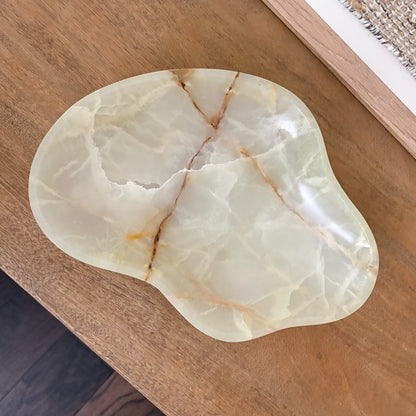 Decorative green onyx stone bowl showcasing one-of-a-kind natural veining