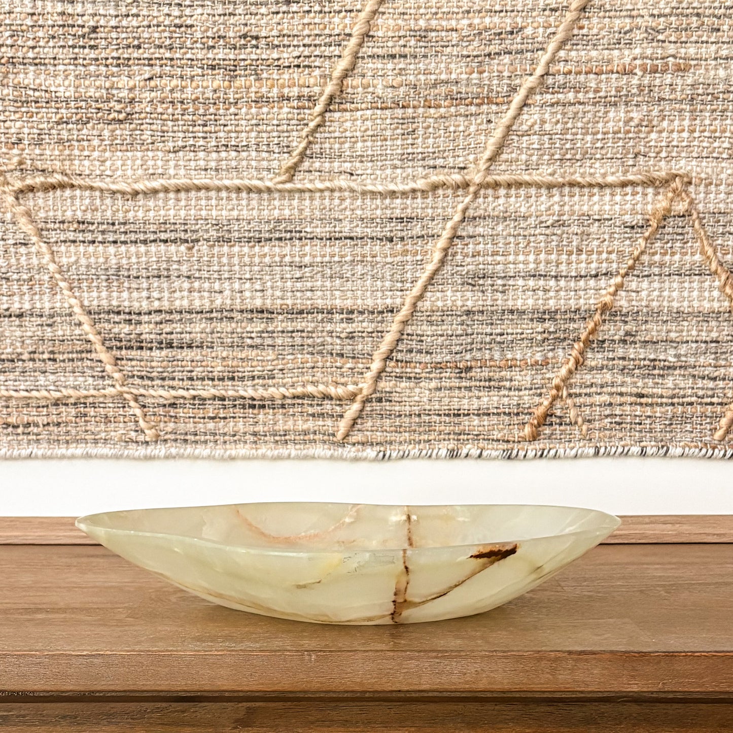 Hand carved green onyx bowl with natural veining for luxury home décor