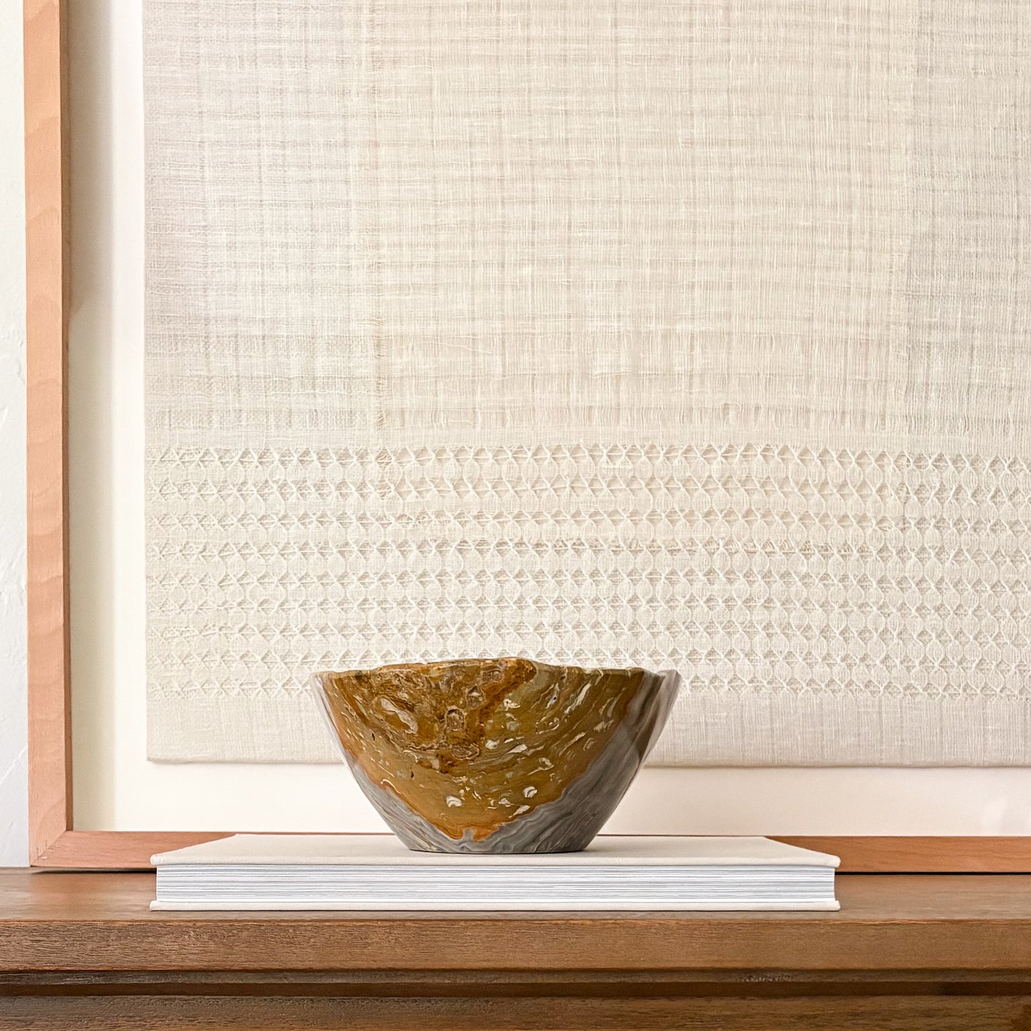 Natural grey onyx bowl with smooth finish and unique patterns