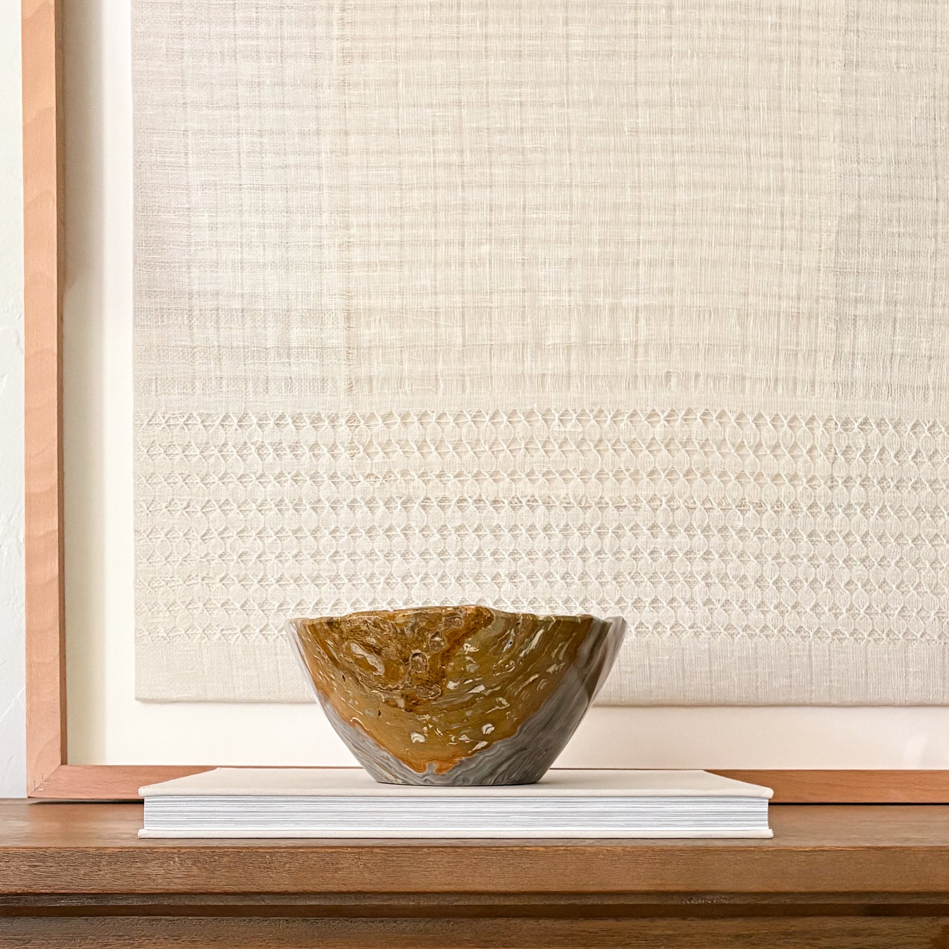 Natural grey onyx bowl with smooth finish and unique patterns