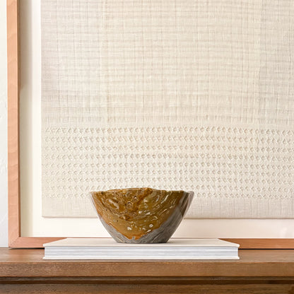 Natural grey onyx bowl with smooth finish and unique patterns