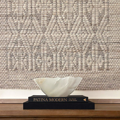 Hand-carved white onyx decorative bowl with natural stone veining