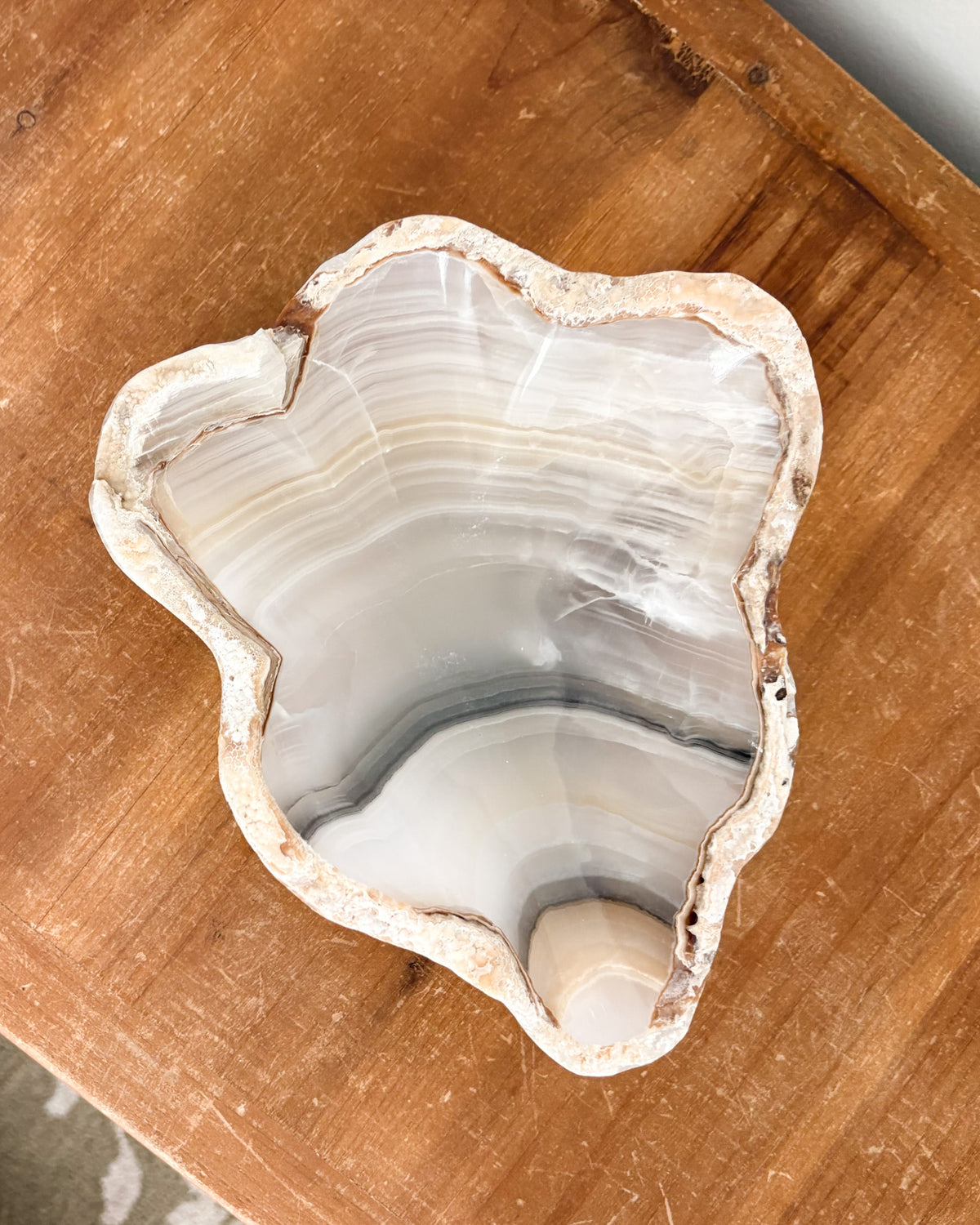 Hand carved natural onyx bowl in smoky grey tones