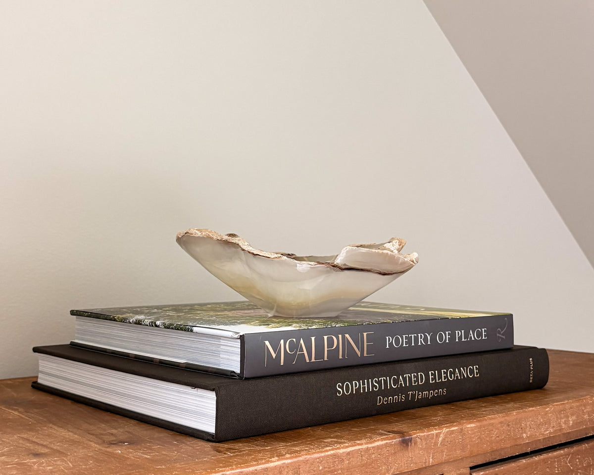 Grey and cream onyx bowl with organic stone veining
