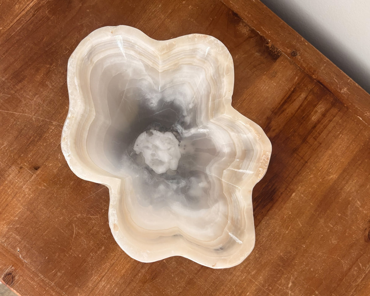 Grey onyx stone bowl with natural color variation
