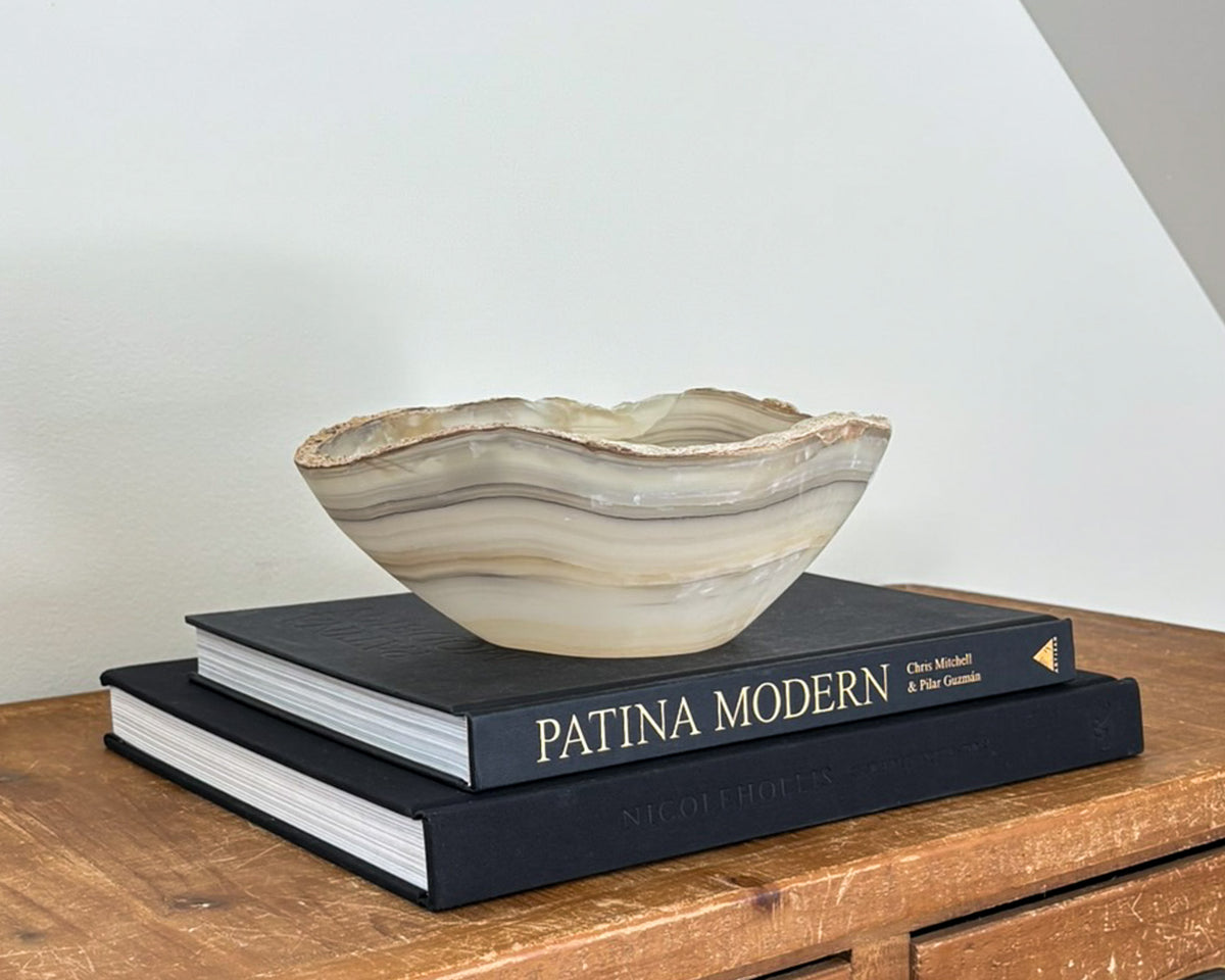 Natural grey onyx bowl with layered mineral patterns and distinctive grey and white veining.