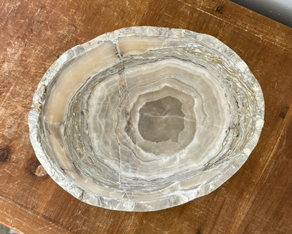 Luxury grey onyx bowl hand-carved from natural stone with beautiful color variations.