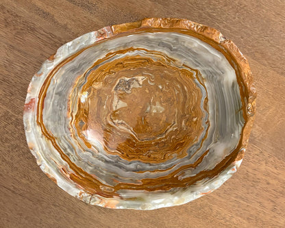 Detailed view of grey onyx bowl featuring layered mineral patterns