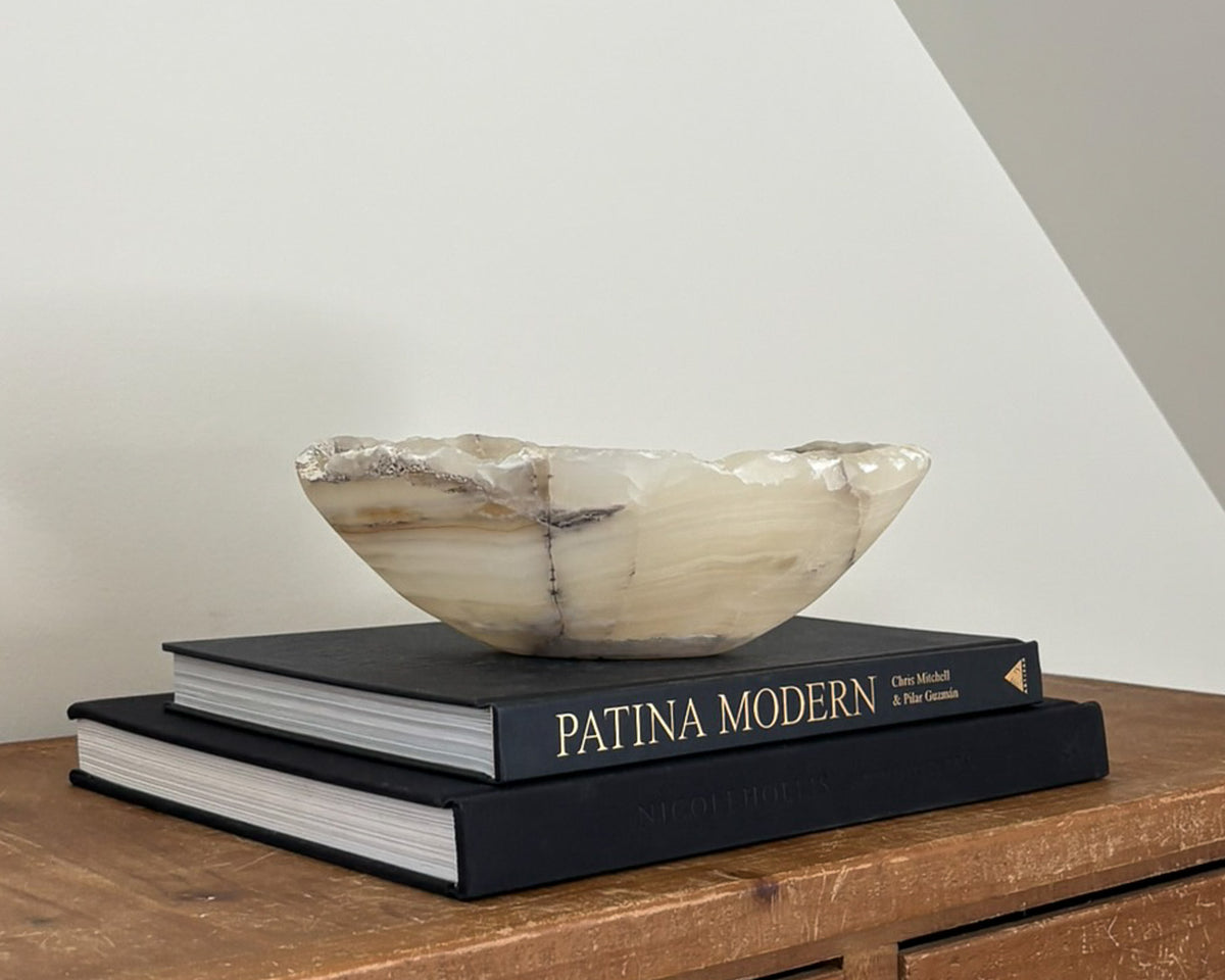 Sculptural grey onyx bowl with unique mineral patterns and smooth finish