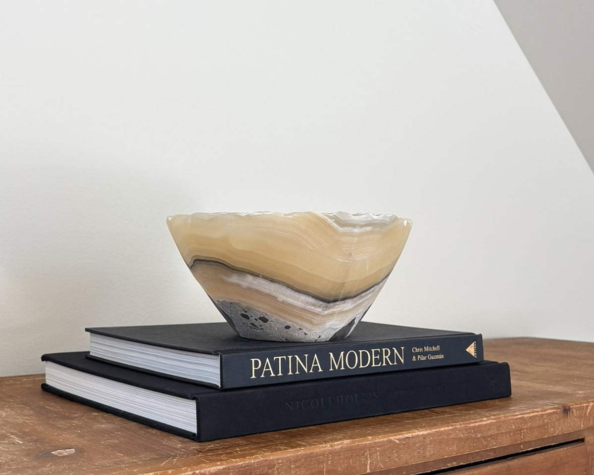Sculptural grey onyx bowl with unique mineral patterns and smooth finish