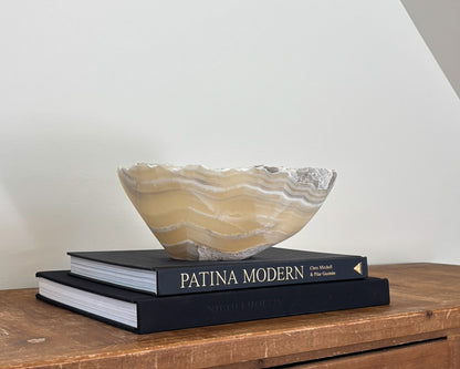 Hand-carved grey onyx bowl with natural veining and distinctive stone patterns