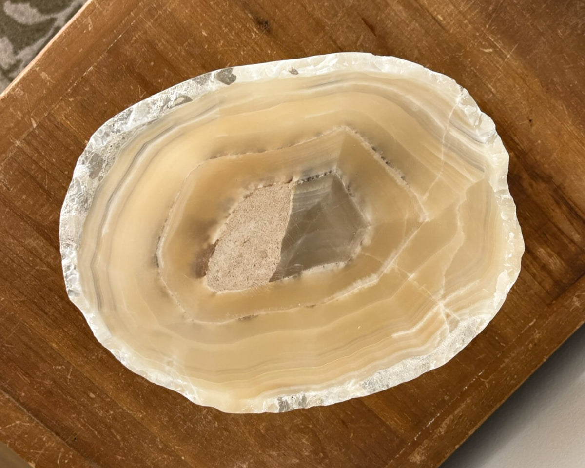 Polished grey onyx decorative bowl with unique mineral patterns
