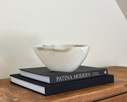 Grey onyx bowl featuring dramatic veining and natural stone texture