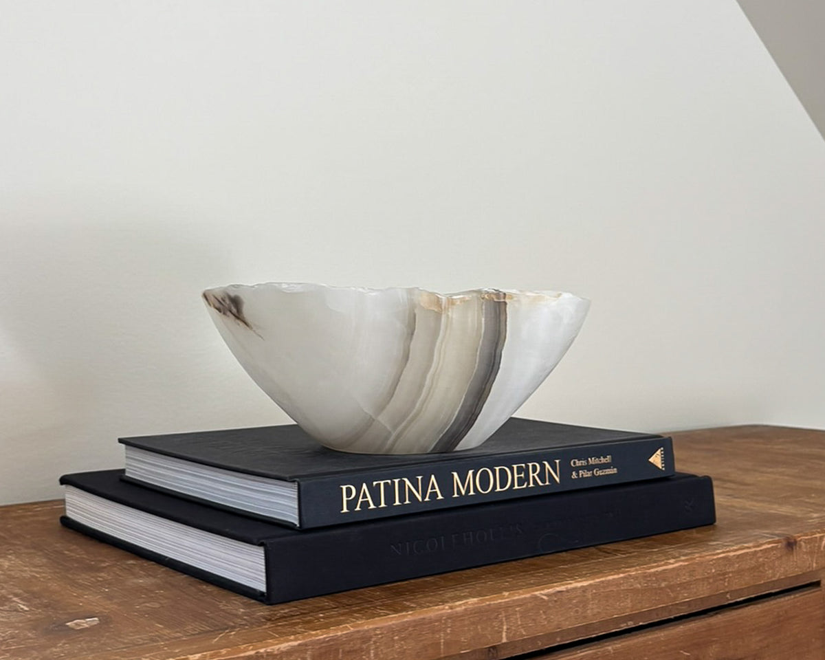 Hand-carved grey onyx bowl with natural veining and distinctive stone patterns