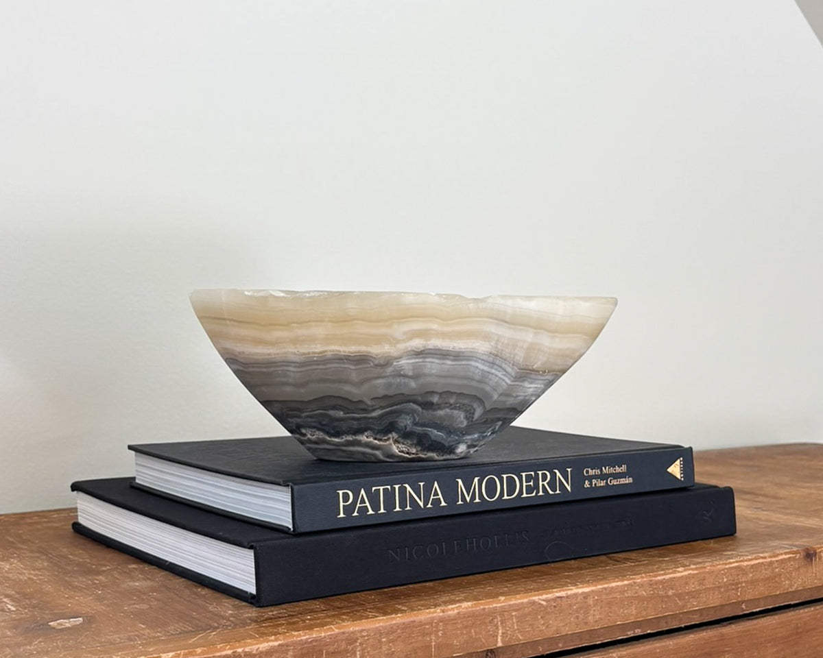 Hand-carved grey onyx bowl with natural veining and distinctive stone patterns