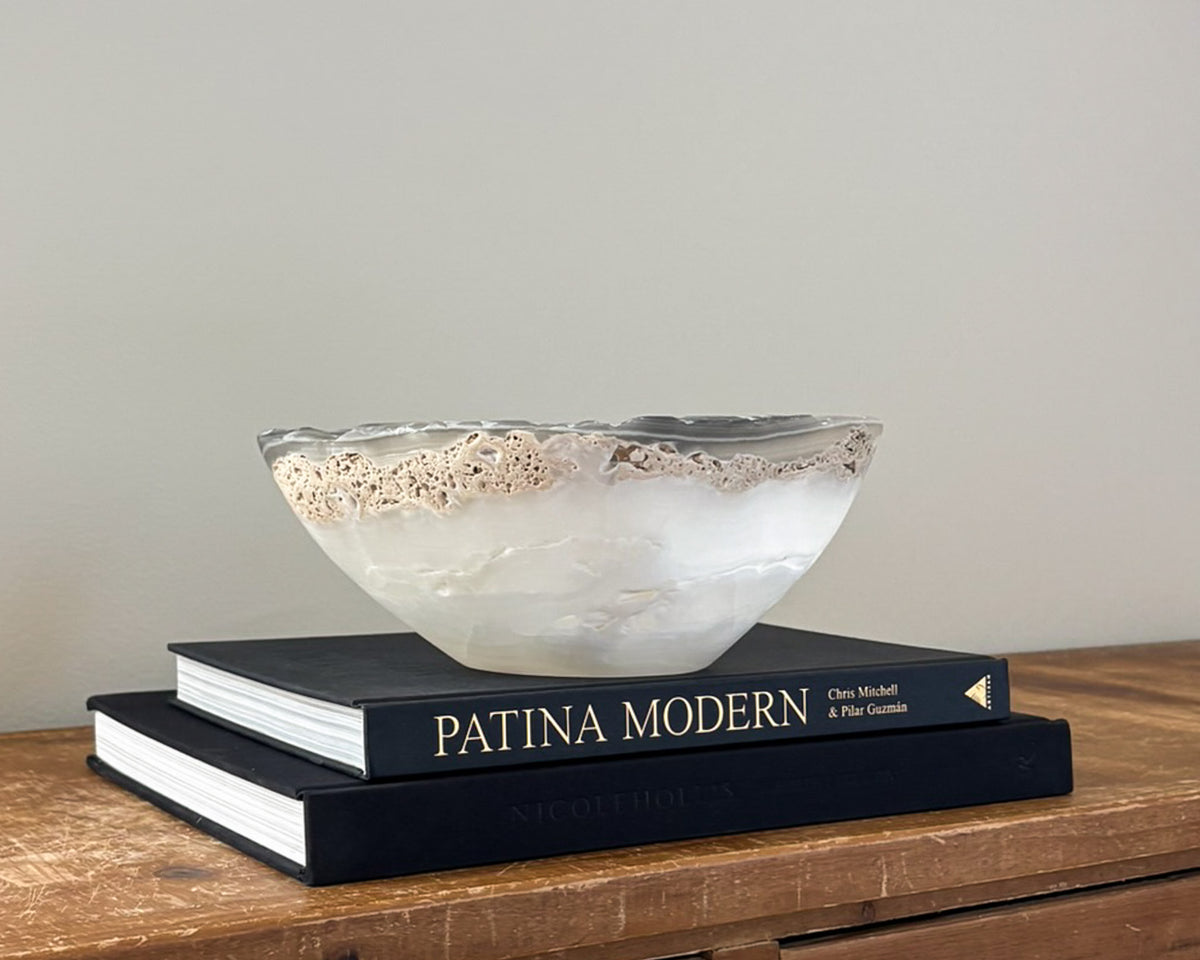 Hand-carved grey onyx bowl with natural stone veining and organic patterns