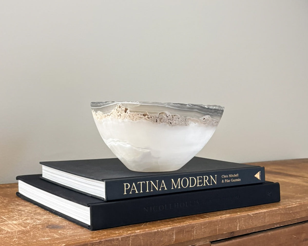 Polished grey onyx bowl featuring unique mineral patterns and tonal variations