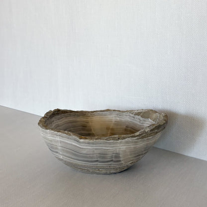 Minimalist hand-carved stone bowl made from grey onyx