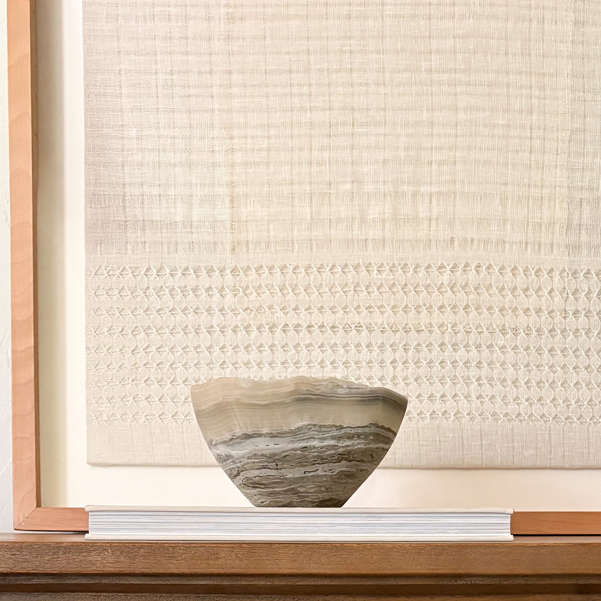 Natural grey onyx bowl with smooth finish and unique patterns