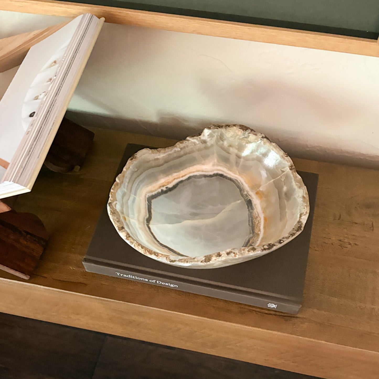 Handcrafted grey onyx bowl displayed as a coffee table accent