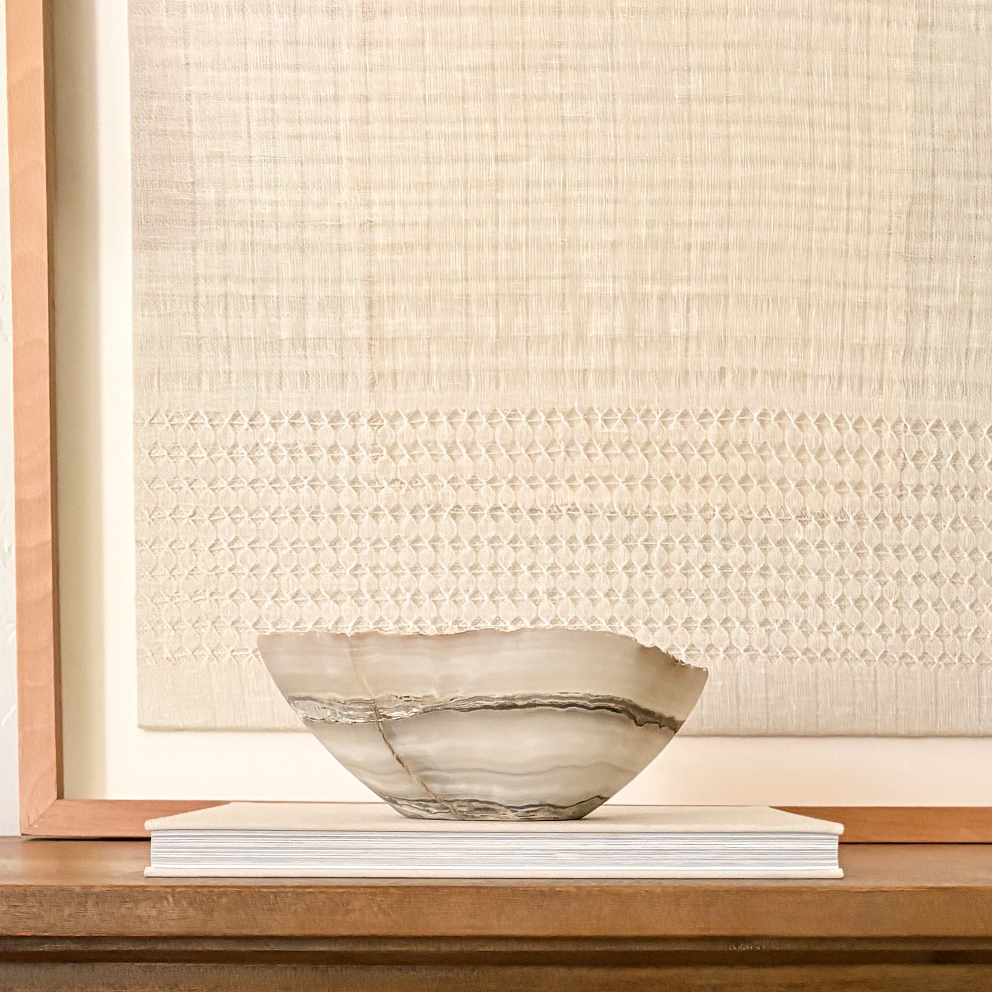 Natural grey onyx bowl with distinctive veining, hand carved for timeless home styling.