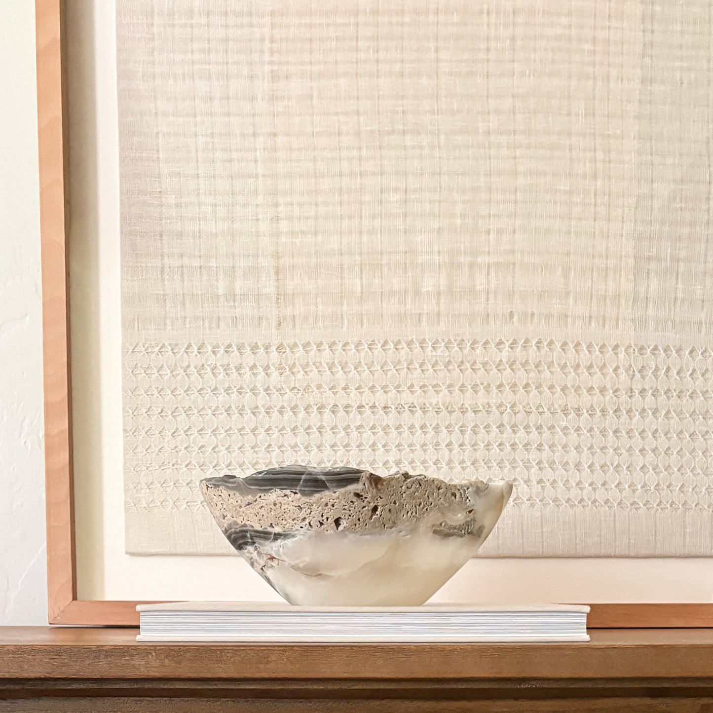 Elegant grey onyx bowl carved from solid natural stone for modern home décor.