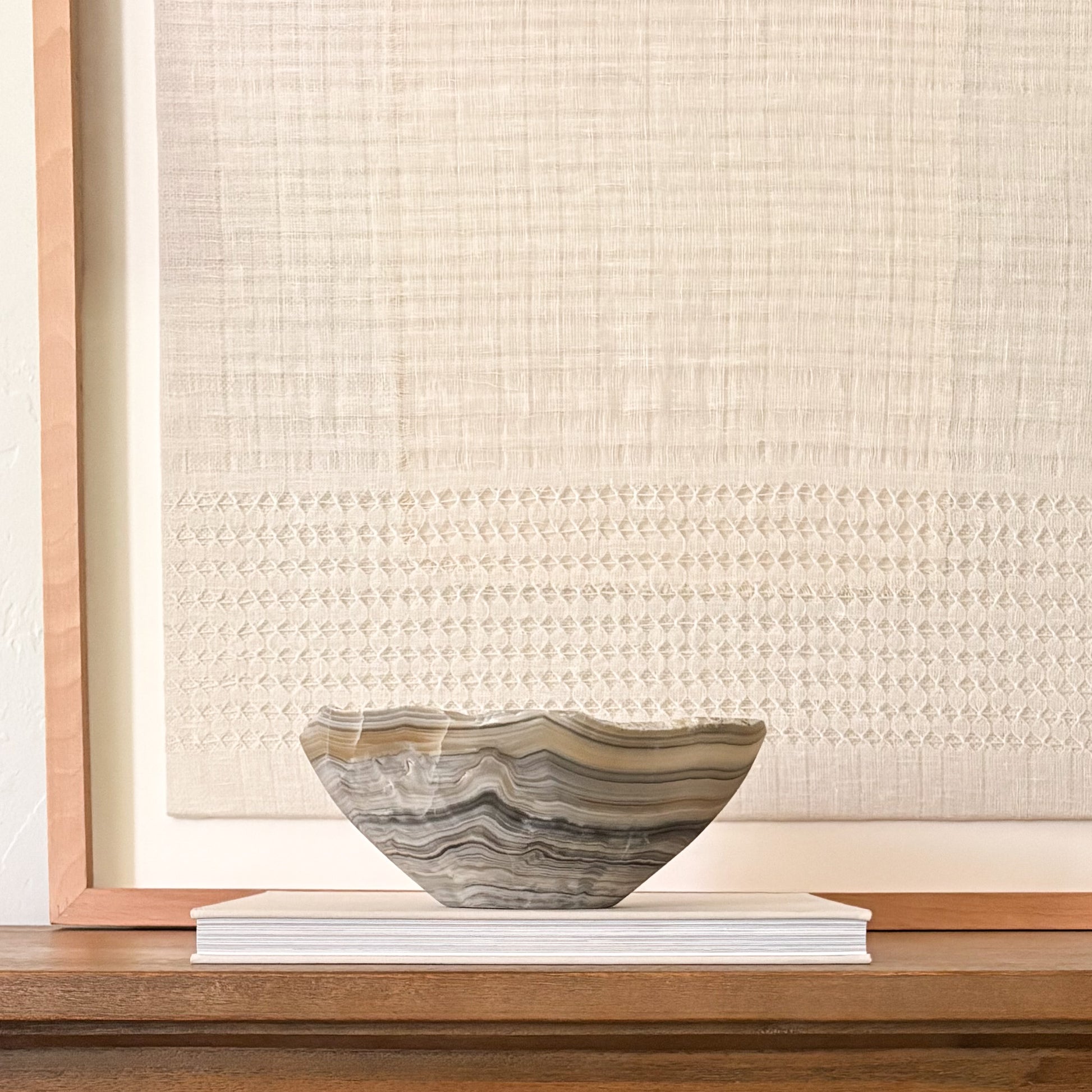 Artisan-crafted grey onyx decorative bowl made from genuine natural stone.